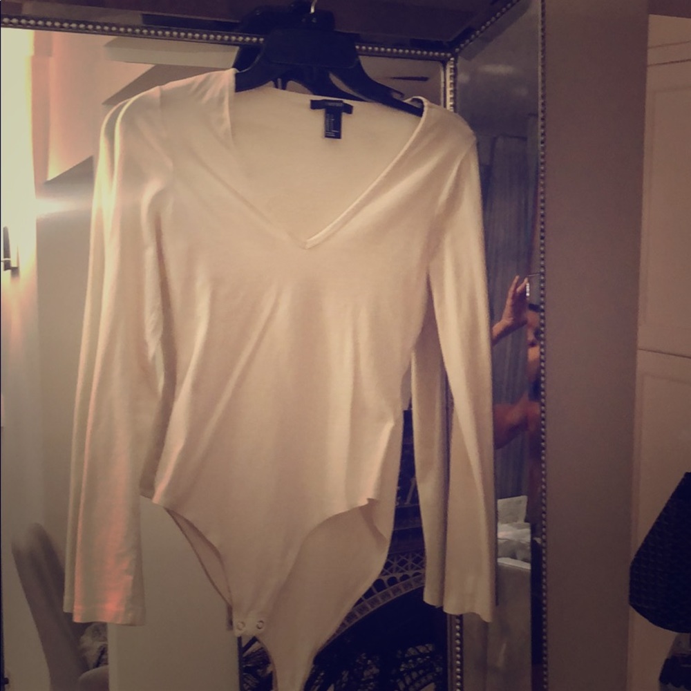 Beige bodysuit. Long sleeve